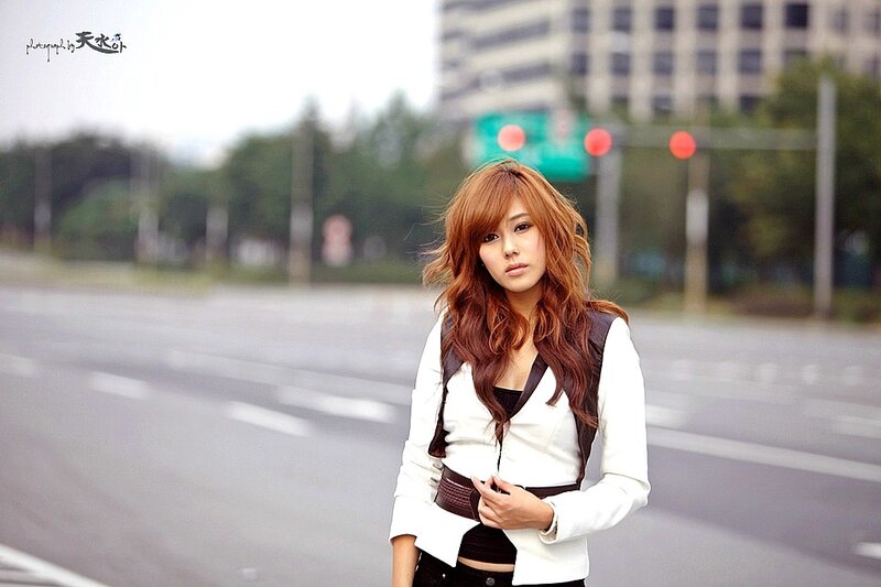woman standing on a street