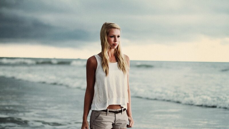 woman standing on beach
