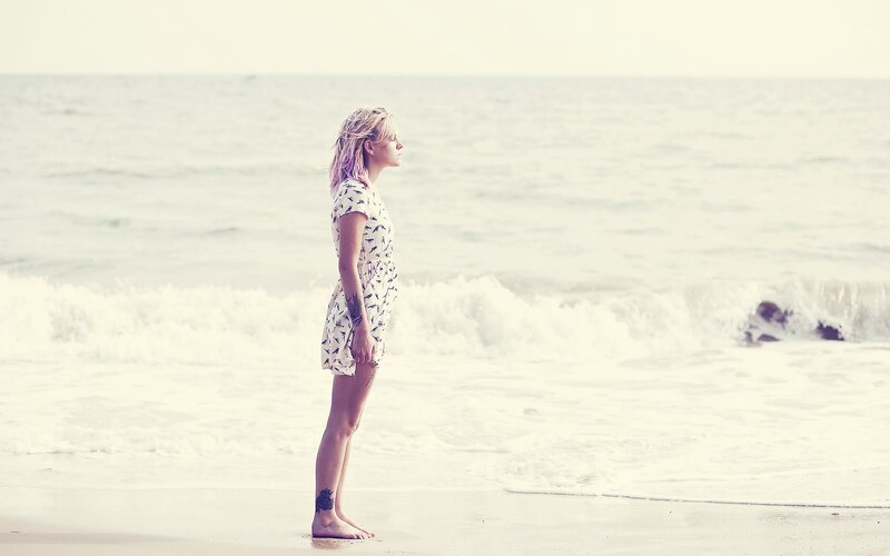 woman standing on beach
