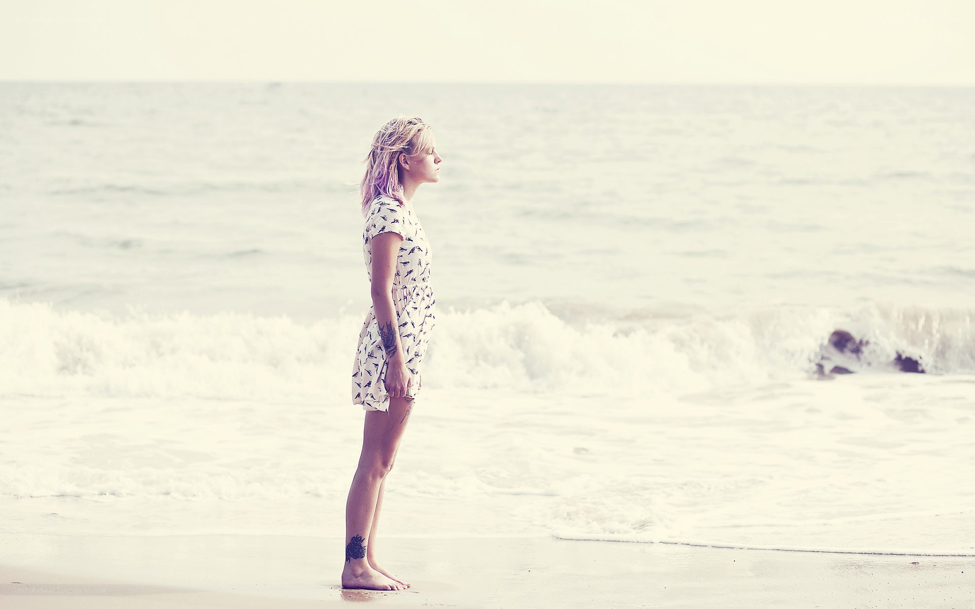 woman standing on beach