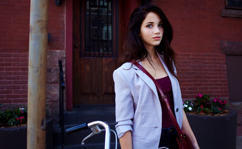 woman standing on city street