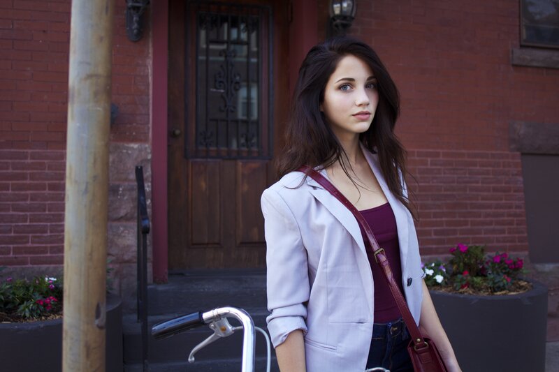woman standing on city street