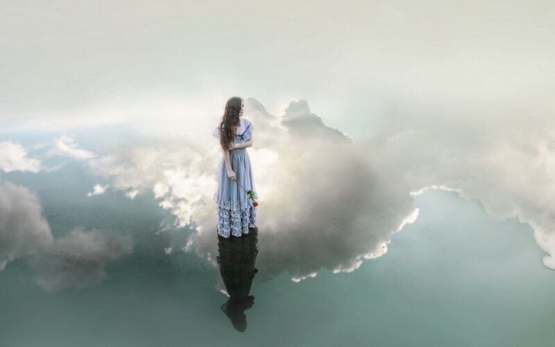woman standing on cloud