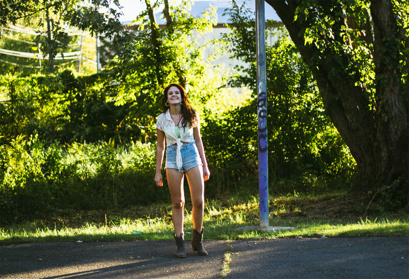 Woman Standing on Road — Green