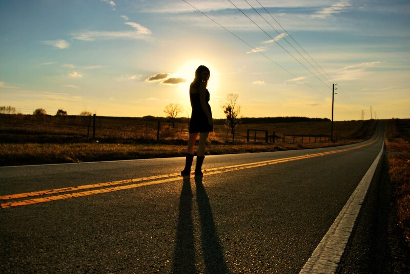 Woman Standing on Road — Yellow
