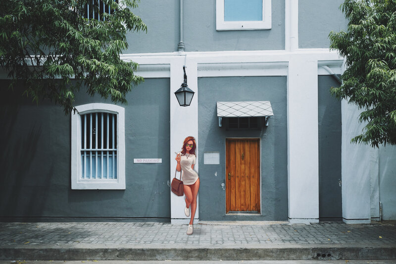 Woman Standing on Sidewalk — Gray