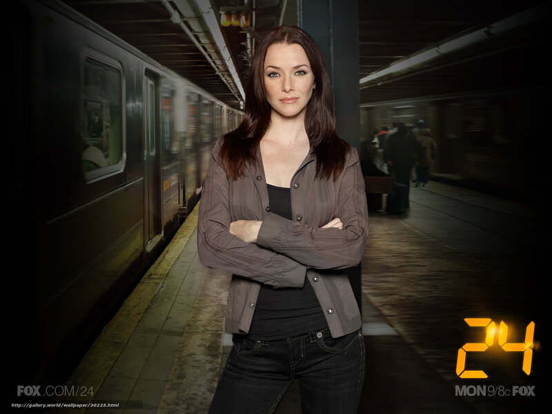 Woman Standing on Subway Platform