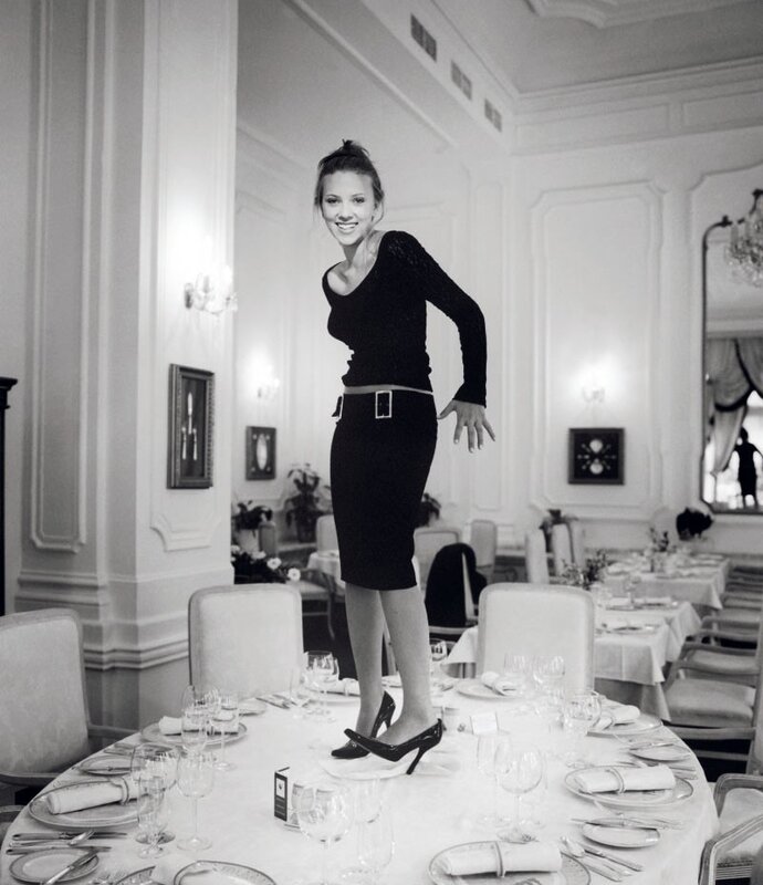 woman standing on table