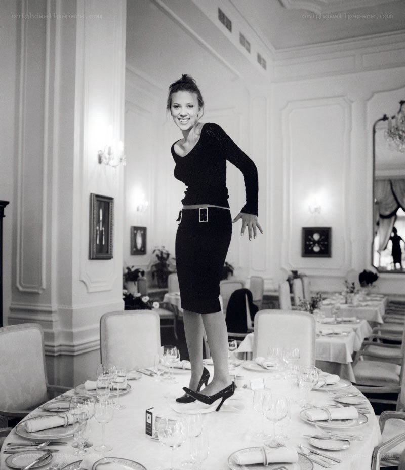 woman standing on table