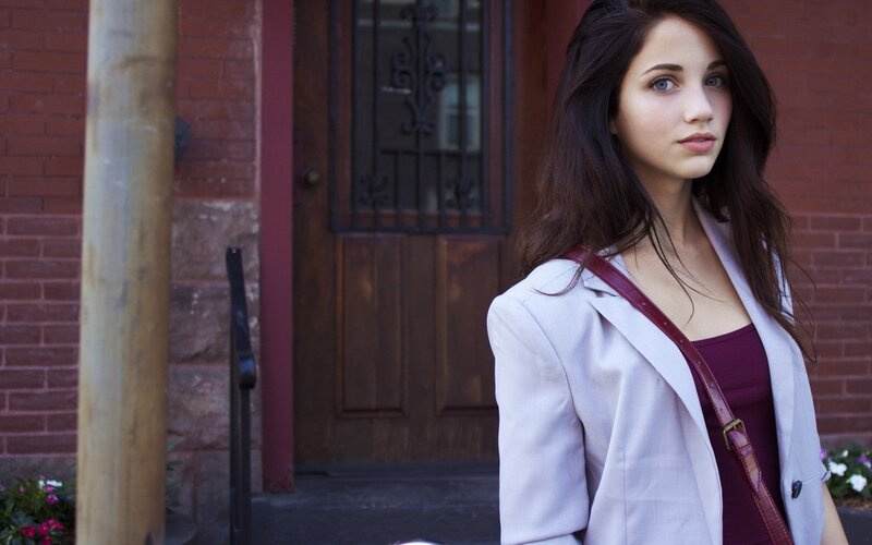 woman standing outside a building