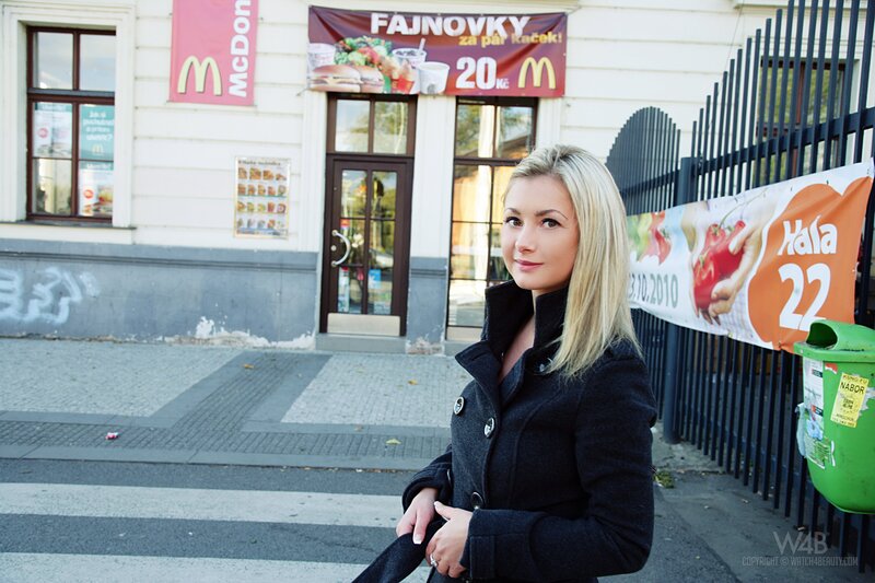 Woman standing outside McDonald's