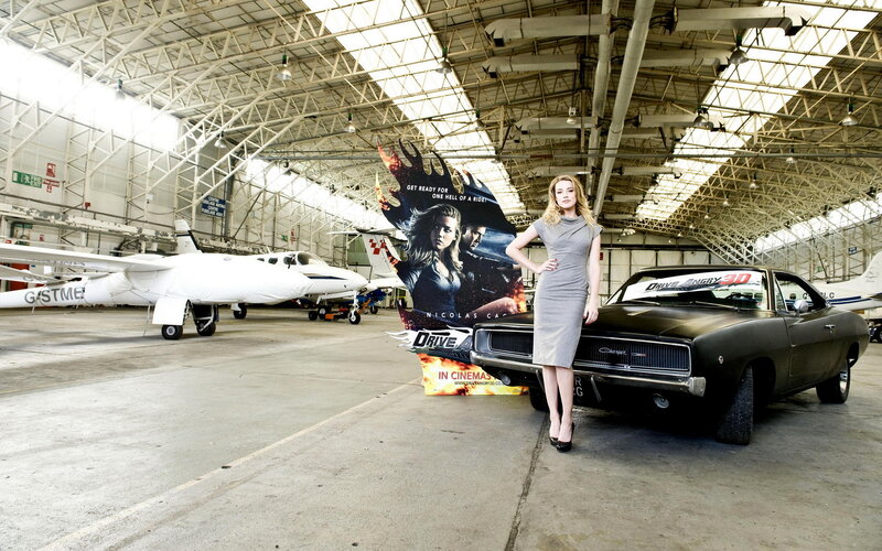 Woman Standing with Car