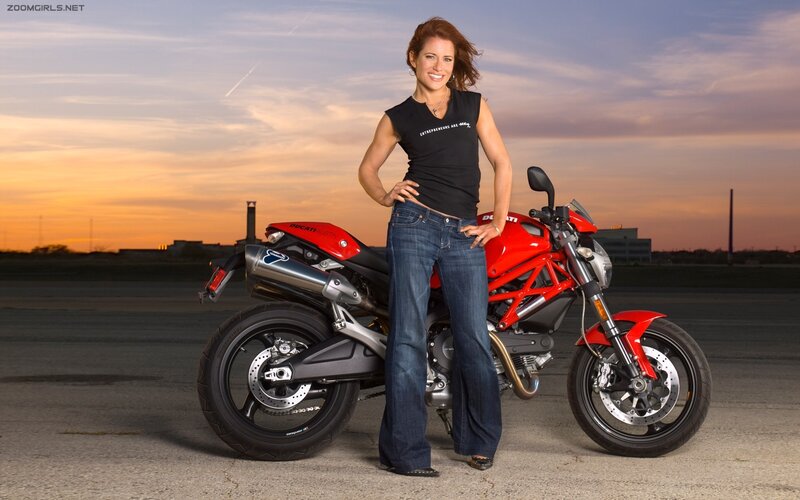 Woman Standing with Motorcycle — Red