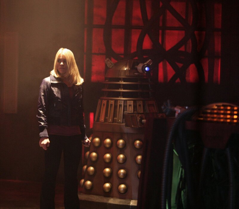 Woman stands with Dalek