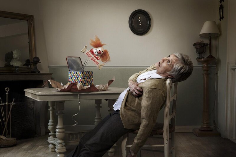 Woman startled by clown toy