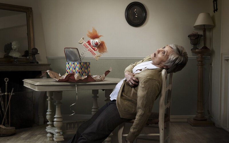 Woman startled by clown toy