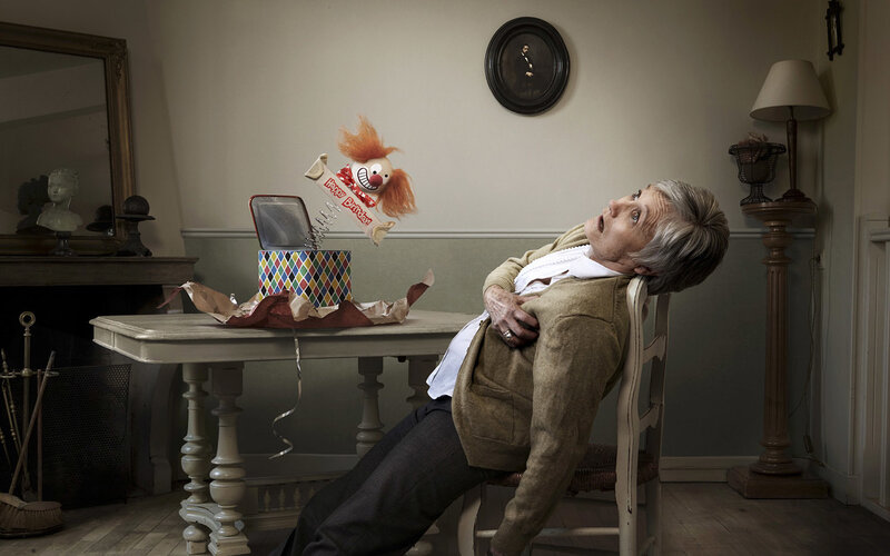 Woman startled by clown toy