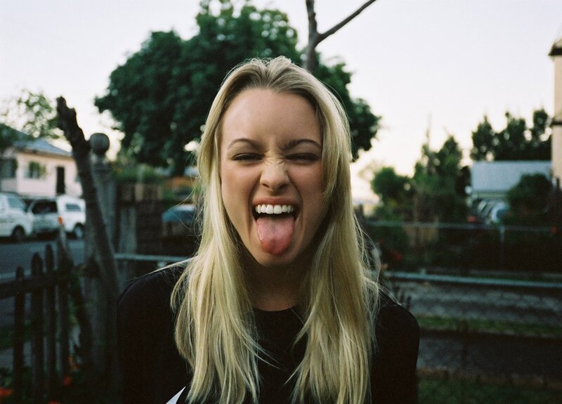 Woman Sticking Out Tongue — Blonde, Playful, Sunset
