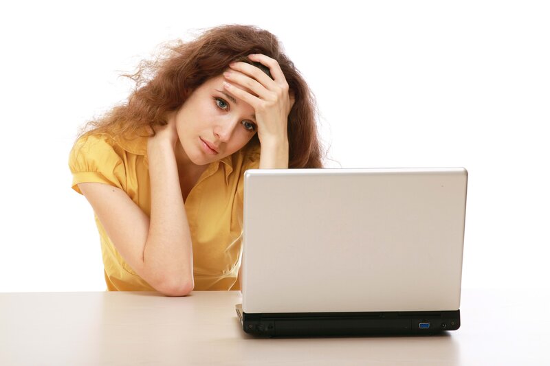 woman stressed at laptop