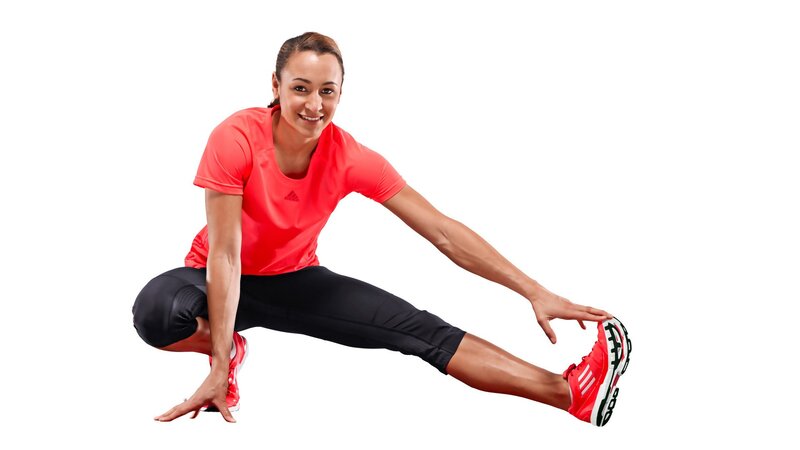 woman stretching in athletic wear