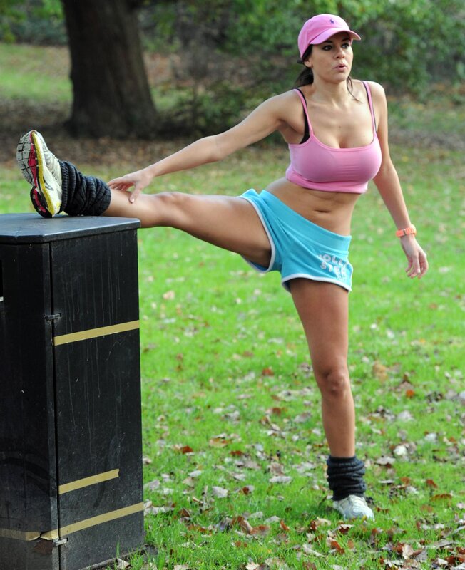 woman stretching in park