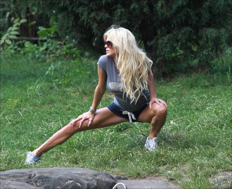 woman stretching in park