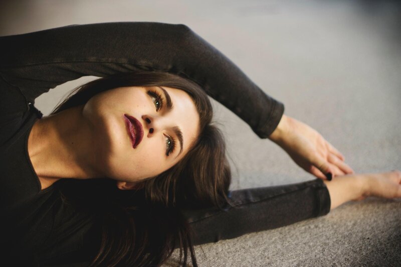 woman stretching on floor