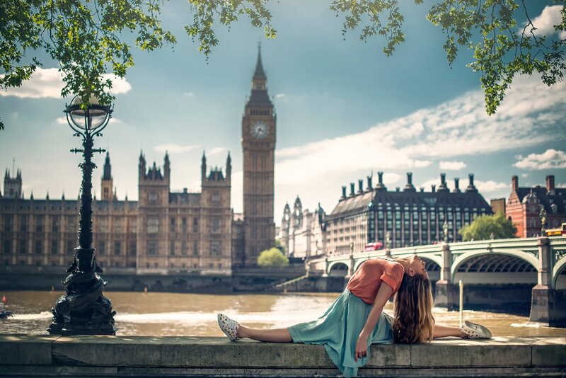 Woman Stretching on Riverbank