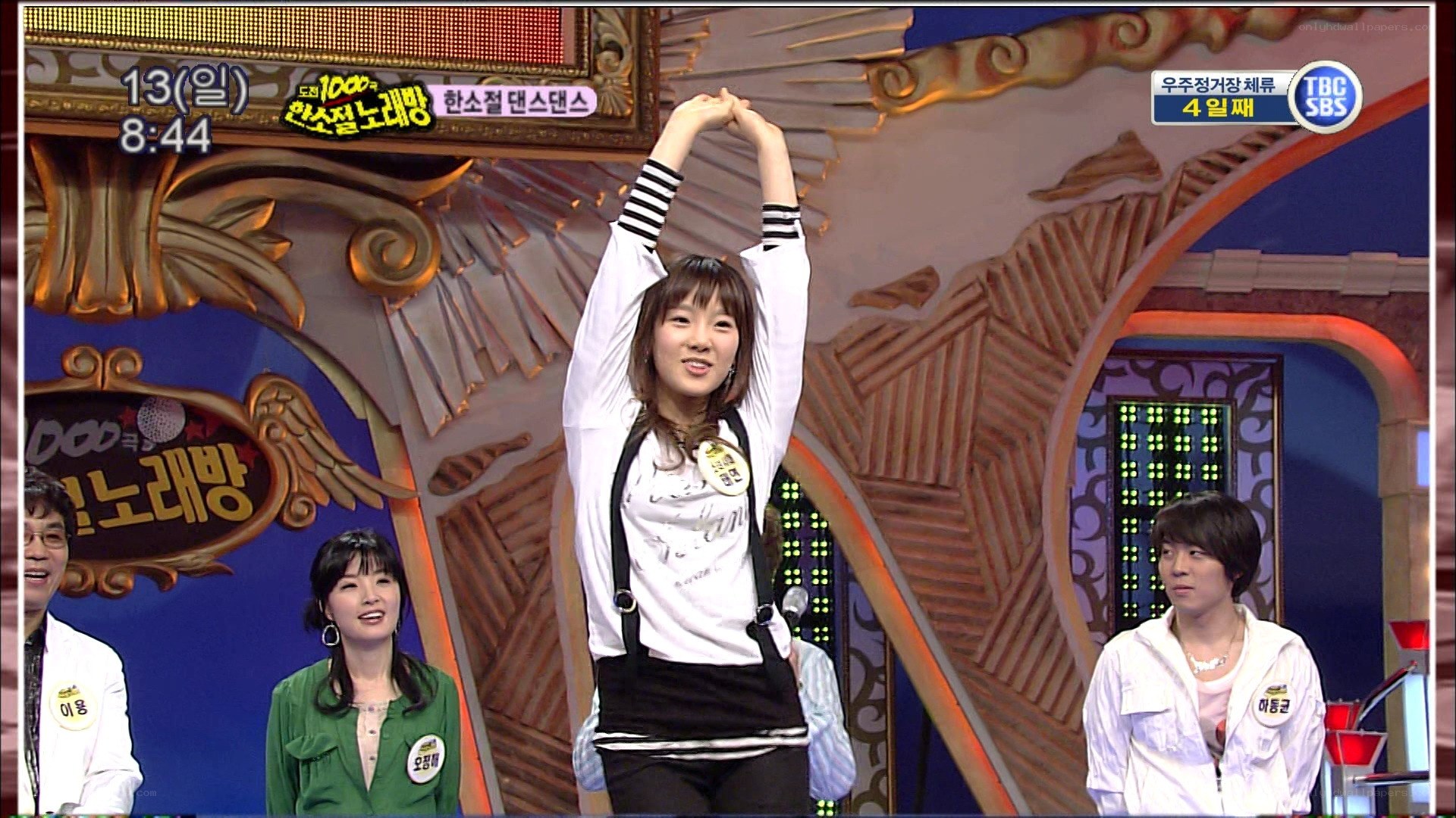 woman stretching on stage