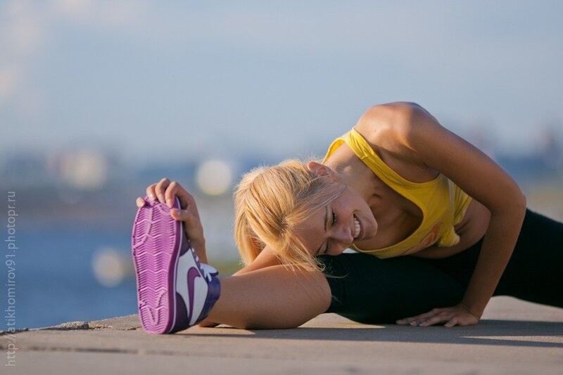 woman stretching outdoors