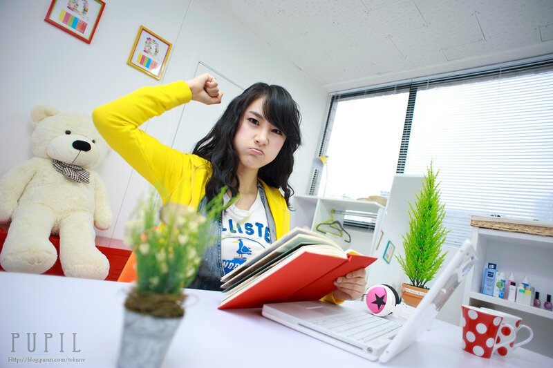 woman studying at desk