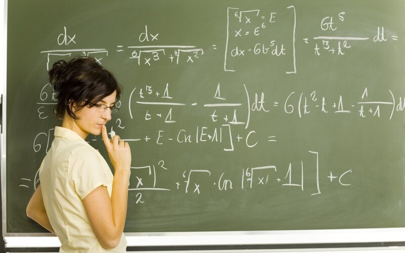 woman studying math equations