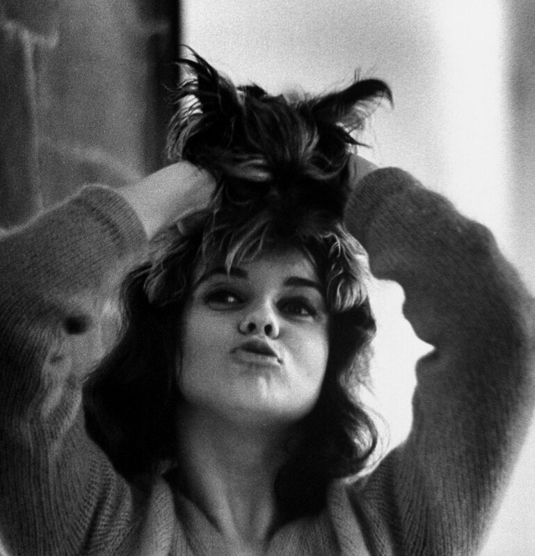 woman styling her hair