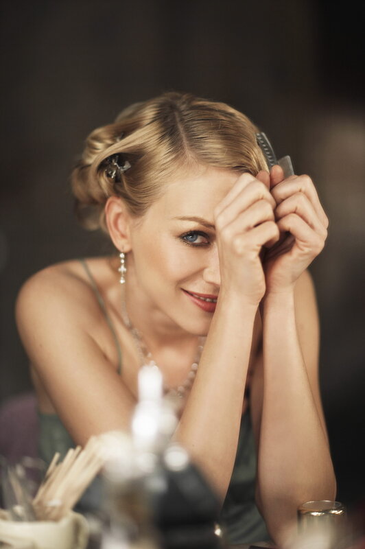 woman styling her hair