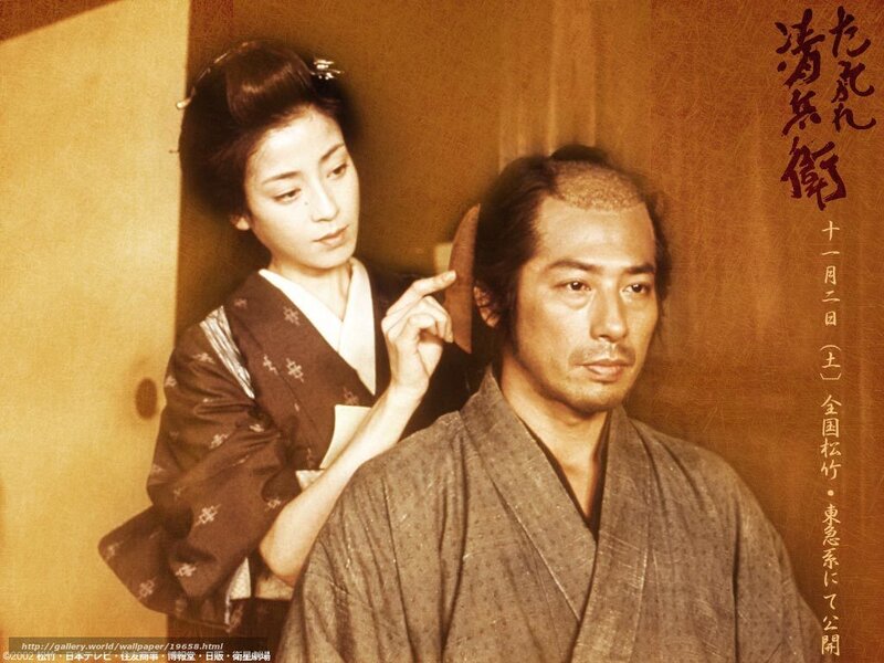 Woman styling man's hair