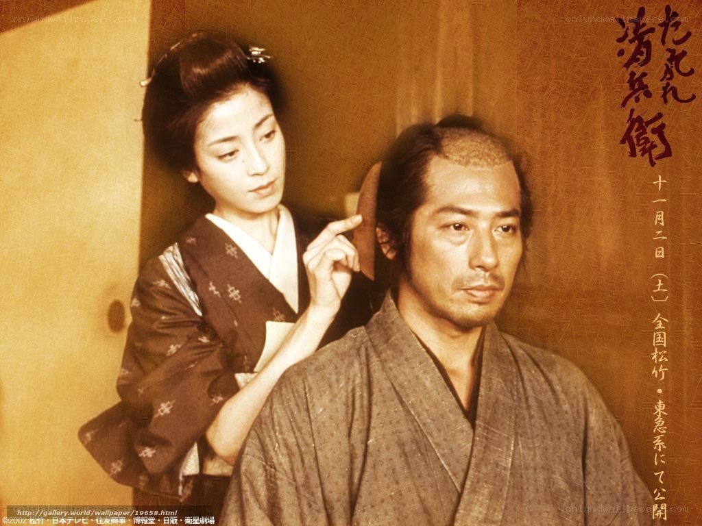 Woman styling man's hair