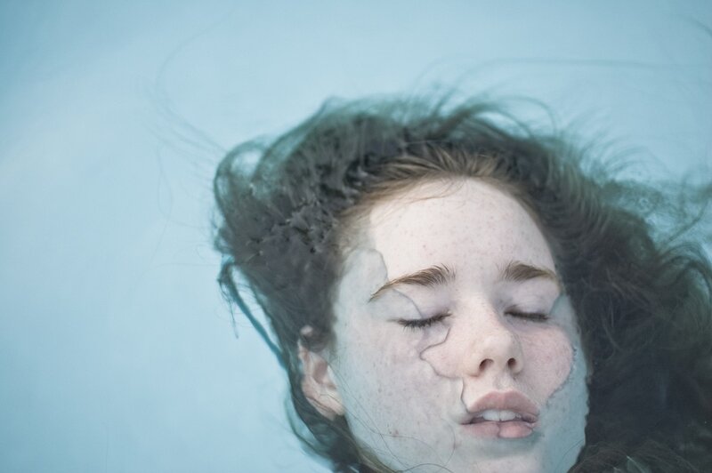 woman submerged in water