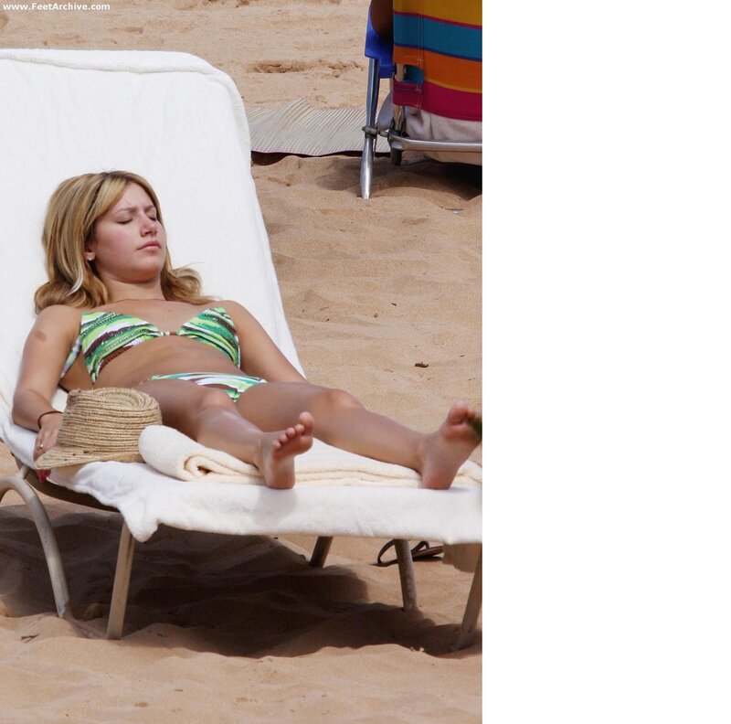 Woman sunbathing on beach