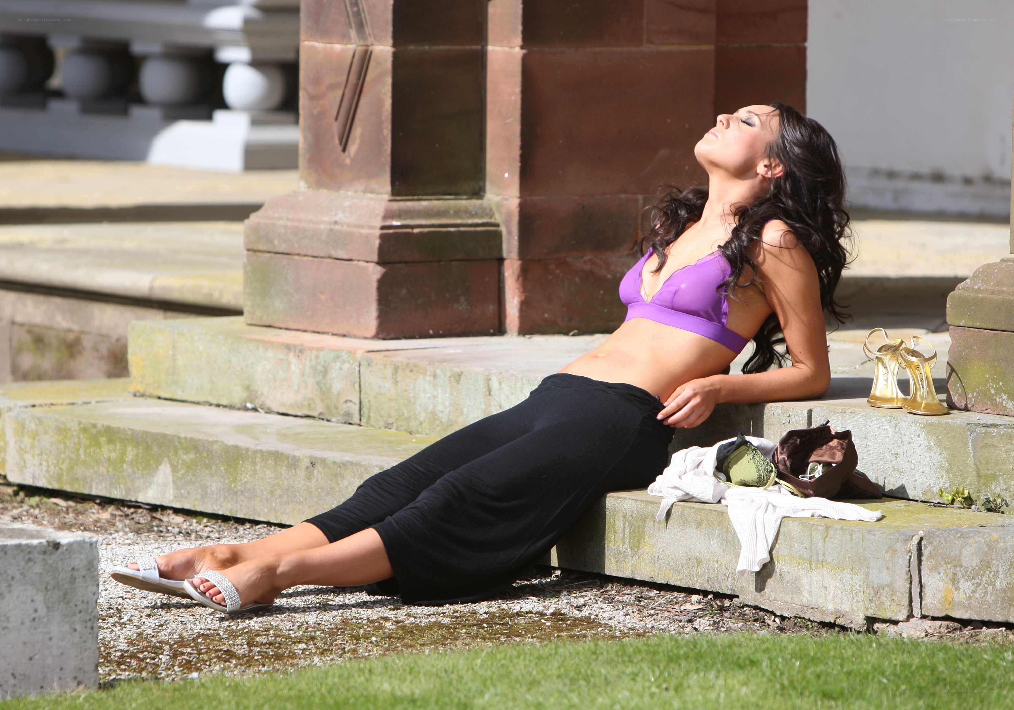 woman sunbathing on steps
