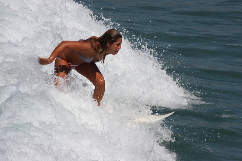 woman surfing on a wave