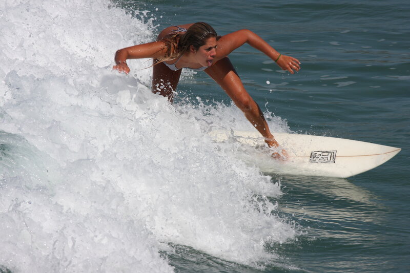 woman surfing on a wave