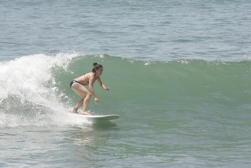woman surfing on a wave