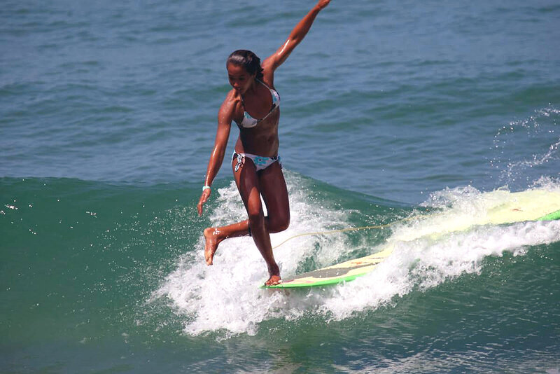 woman surfing on a wave