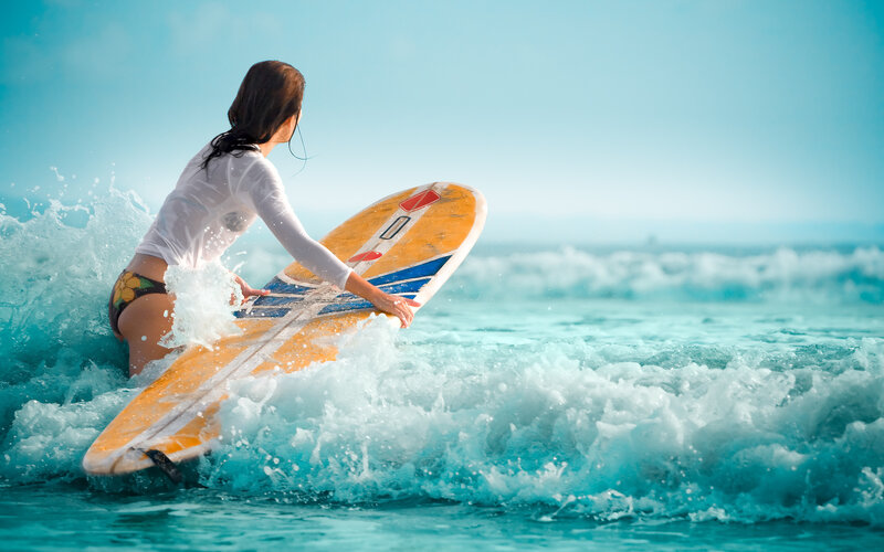 Woman Surfing on Wave — Blue, Active