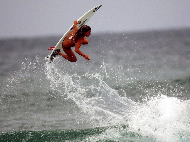 Woman Surfing on Wave — White