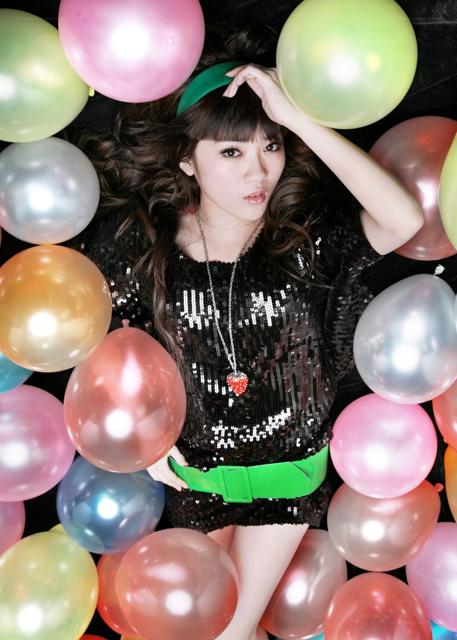 woman surrounded by balloons