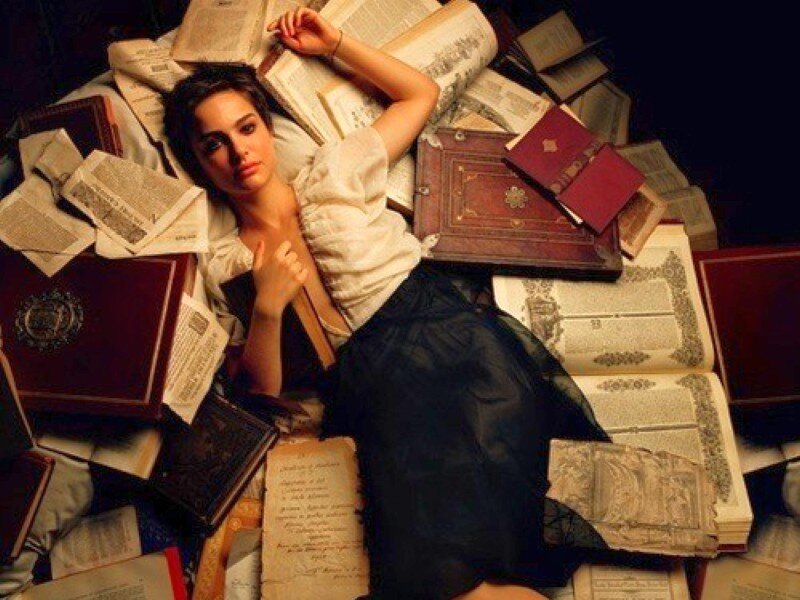 woman surrounded by books