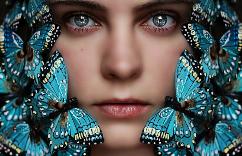 Woman Surrounded by Butterflies — Blue, Dramatic
