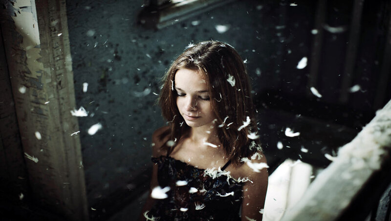 Woman Surrounded by Feathers — Black