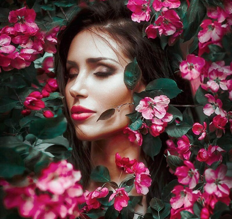 Woman Surrounded by Flowers — Pink, Serene, Spring